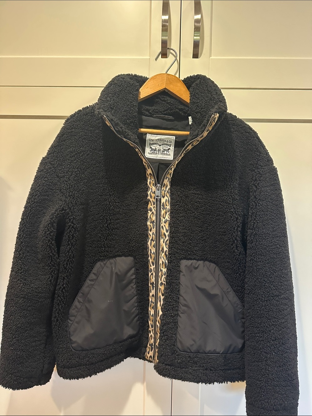 Woman’s Black Sherpa Jacket with Leopard-Trim Zip